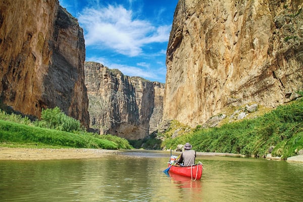 The Rio Grande River winds 12 miles down Santa Elena Canyon in Big Bend National Park, Texas. When the water is high you can come down the 1,500 foot walled canyon. With less water flowing, guides take you 3 to 4 miles up the canyon with some spots having to portage. But take it all in stride because the views are breathtaking. I recommend Big Bend River Tours. You might get lucky and have the guides that take you a half mile up a side canyon. An excellent day excursion in the out of the way national park.