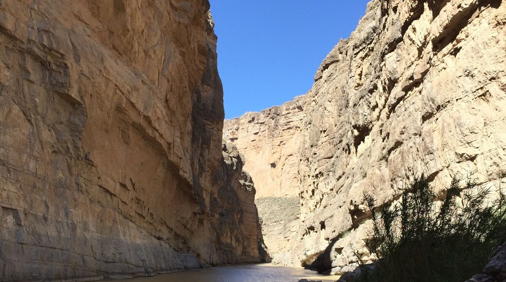 Depending on the water level, you might need to wade thru or step over a relatively narrow creek to get to the best viewing spot overlooking Santa Elena Canyon in Big Bend National Park. In the picture, the left side of the river is Mexico; USA is on the right side.