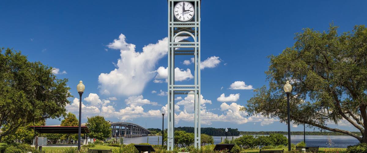 Photo of the clock tower at Riverfront Park in Palatka along the St John's River in Florida on a beautiful sunny day