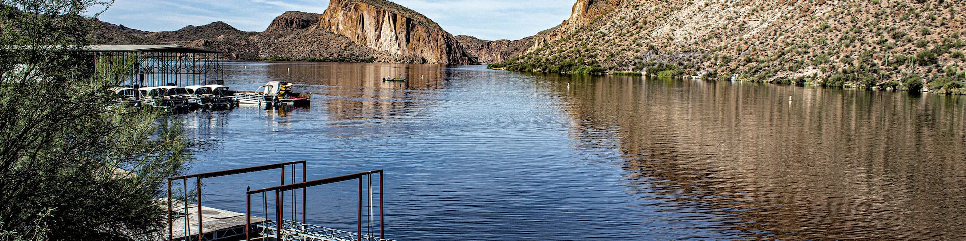 Canyon Lake a reservoir on the Apache trail and formed by the Mormon Flat Dam on the Salt River in Arizona. It is in the Superstition Wilderness of Tonto National Forest.