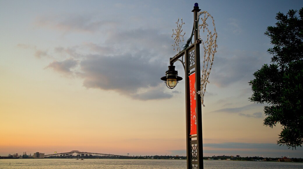 Bord Du Lac Park featuring general coastal views and a sunset