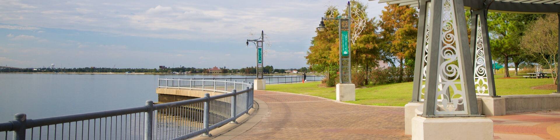 Bord Du Lac Park which includes general coastal views and a garden