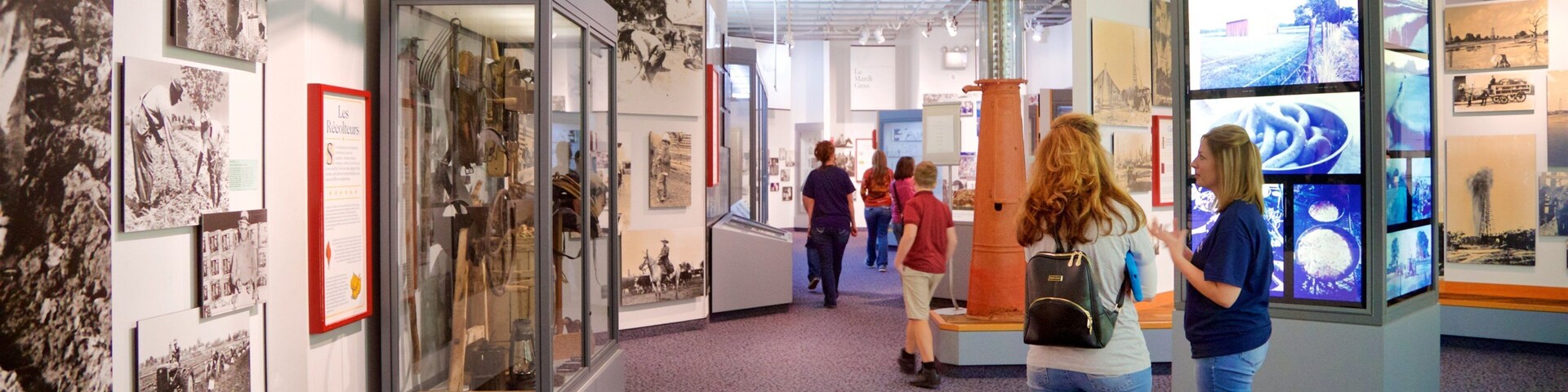 Acadian Cultural Center which includes interior views as well as a small group of people