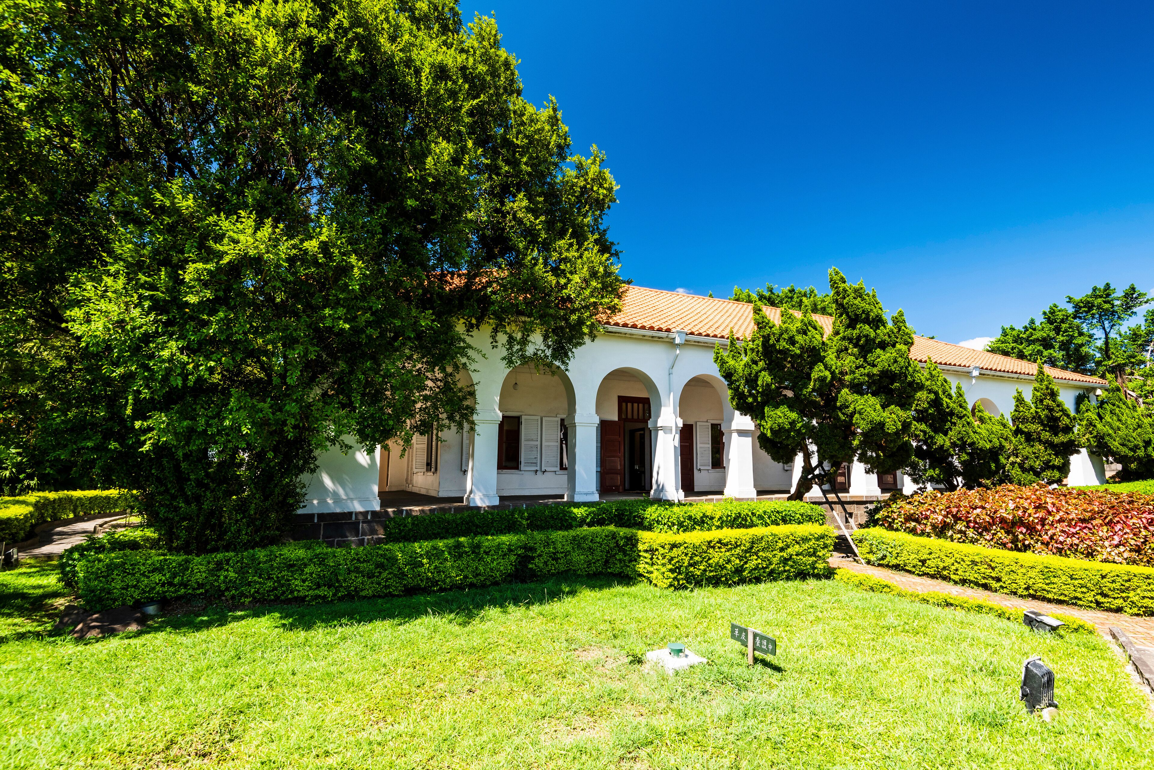 View of Former Tamsui Customs Officer's Residence in New Taipei City, Taiwan. It's a white building built in a U.K. colonial style nicknamed Little White House.