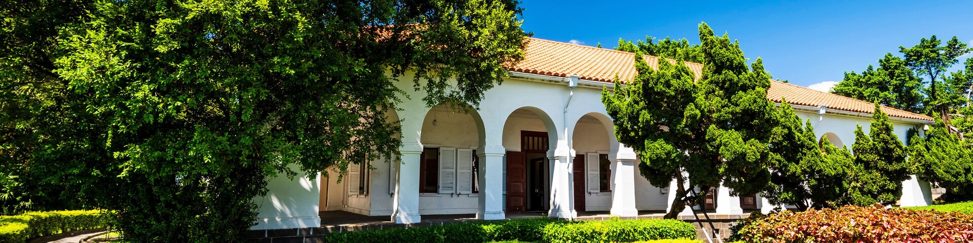 View of Former Tamsui Customs Officer's Residence in New Taipei City, Taiwan. It's a white building built in a U.K. colonial style nicknamed Little White House.