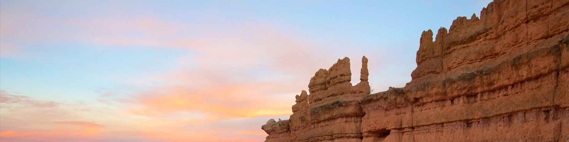 Tropic featuring mountains, landscape views and a sunset