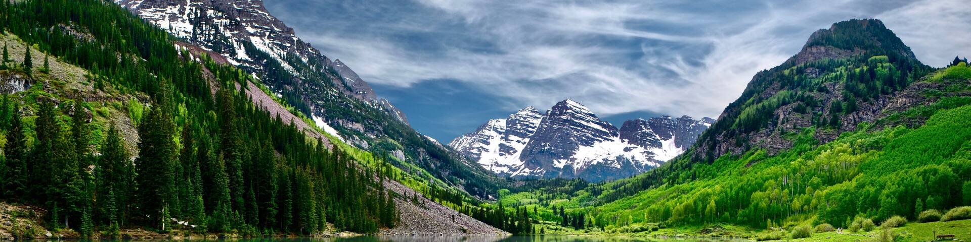 Maroon Bells reflections in calm clear water of Maroon Lake near Aspen. Colorado. United States of America