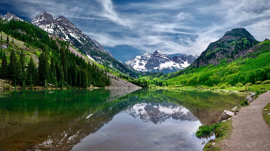Maroon Bells reflections in calm clear water of Maroon Lake near Aspen. Colorado. United States of America