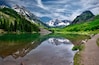 Maroon Bells reflections in calm clear water of Maroon Lake near Aspen. Colorado. United States of America