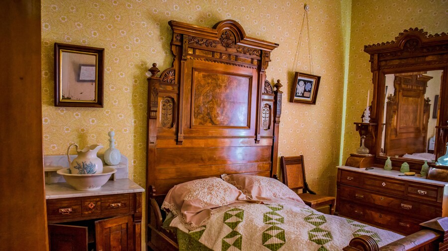 Bedroom in a restored old pioneer home