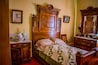 Bedroom in a restored old pioneer home