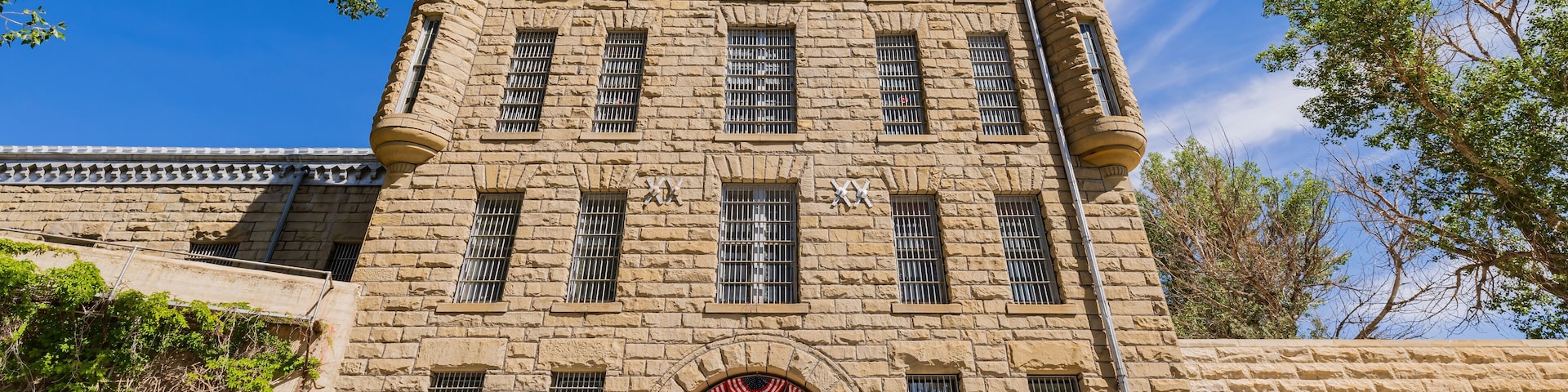 Sunny exterior view of the Wyoming Frontier Prison Museum