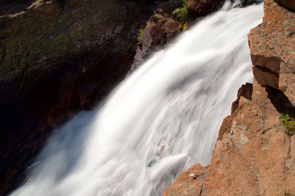 A waterfall cascading down a rocky cliff.