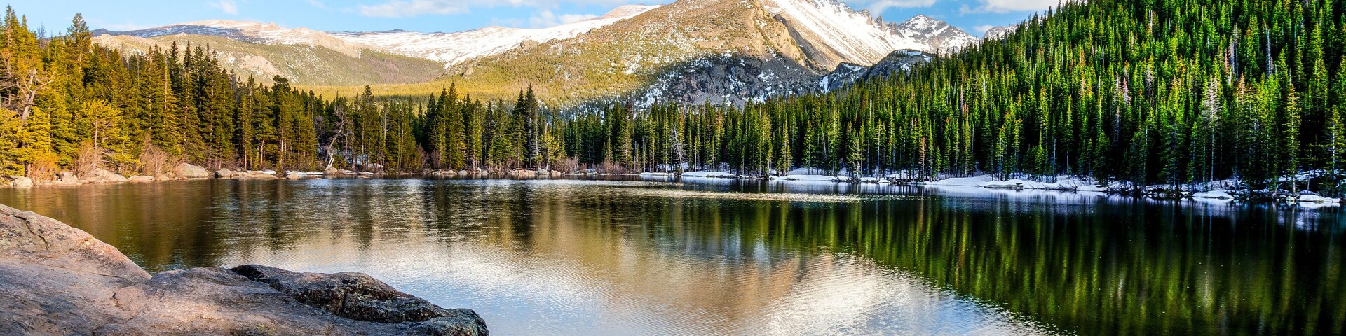 Bear Lake in the Rocky Mountain National Park in Colorado, is magnificent::clear, serene, cold,