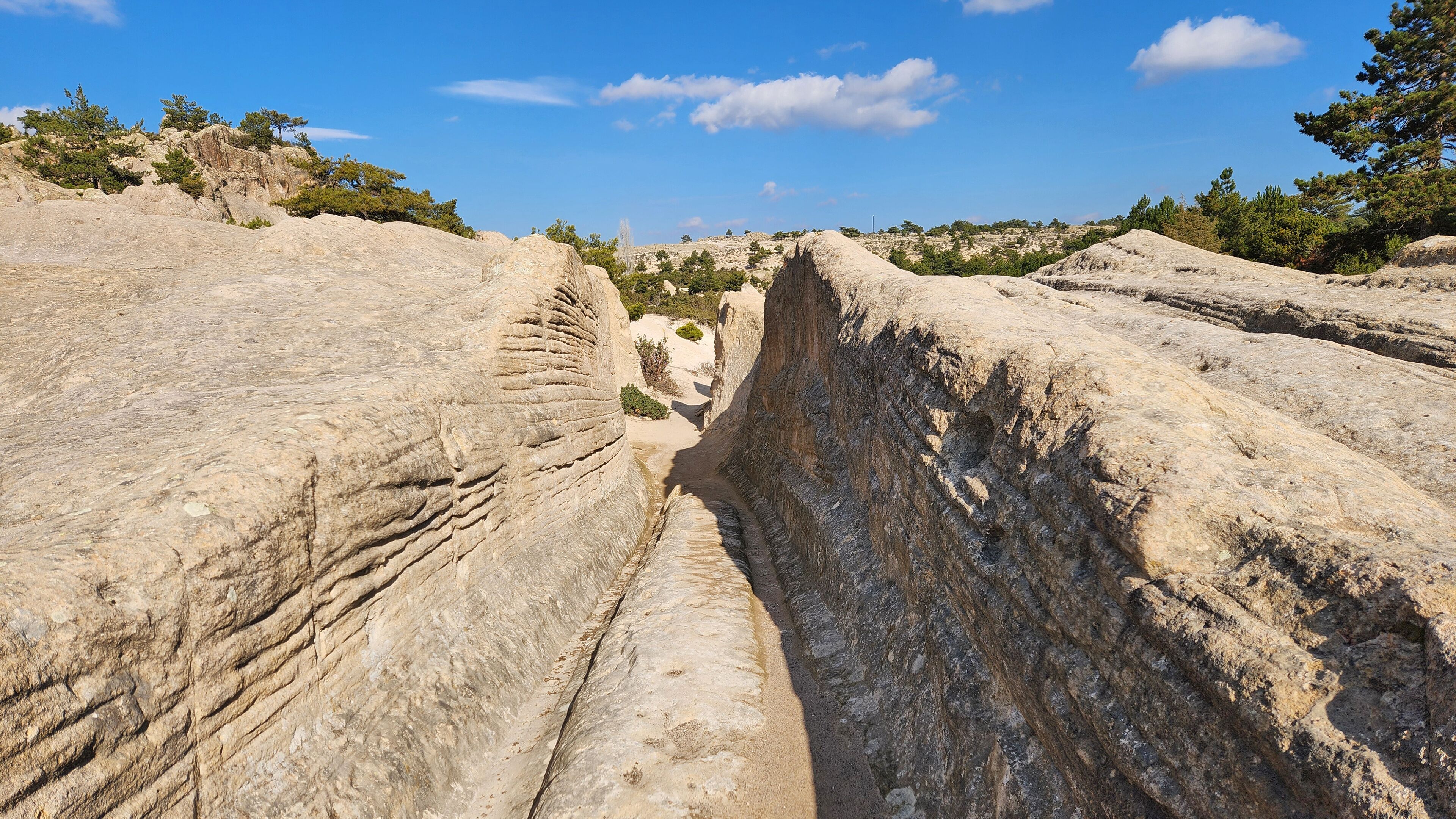 The King's Road in the ancient Phrygian Valley is a historic path linking major Phrygian cities, adorned with rock carvings and monuments, reflecting rich cultural heritage.