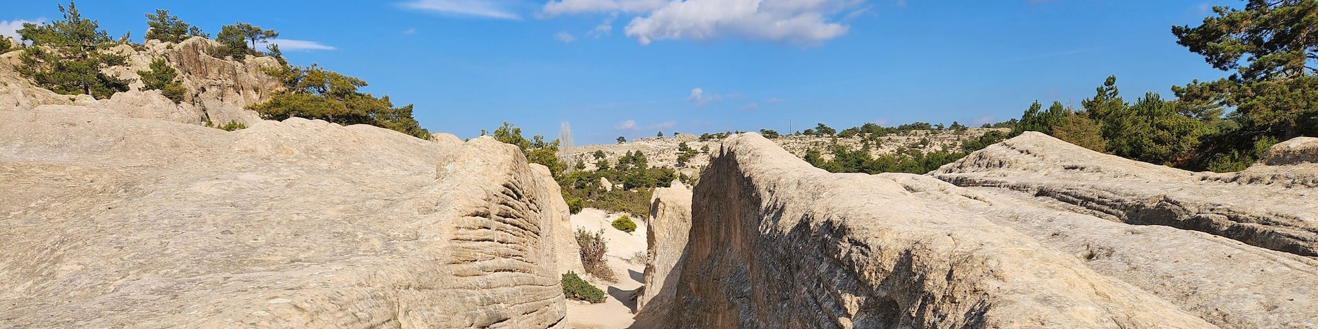 The King's Road in the ancient Phrygian Valley is a historic path linking major Phrygian cities, adorned with rock carvings and monuments, reflecting rich cultural heritage.