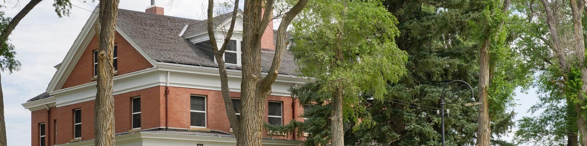 Crawford featuring vehicle touring, a house and heritage architecture