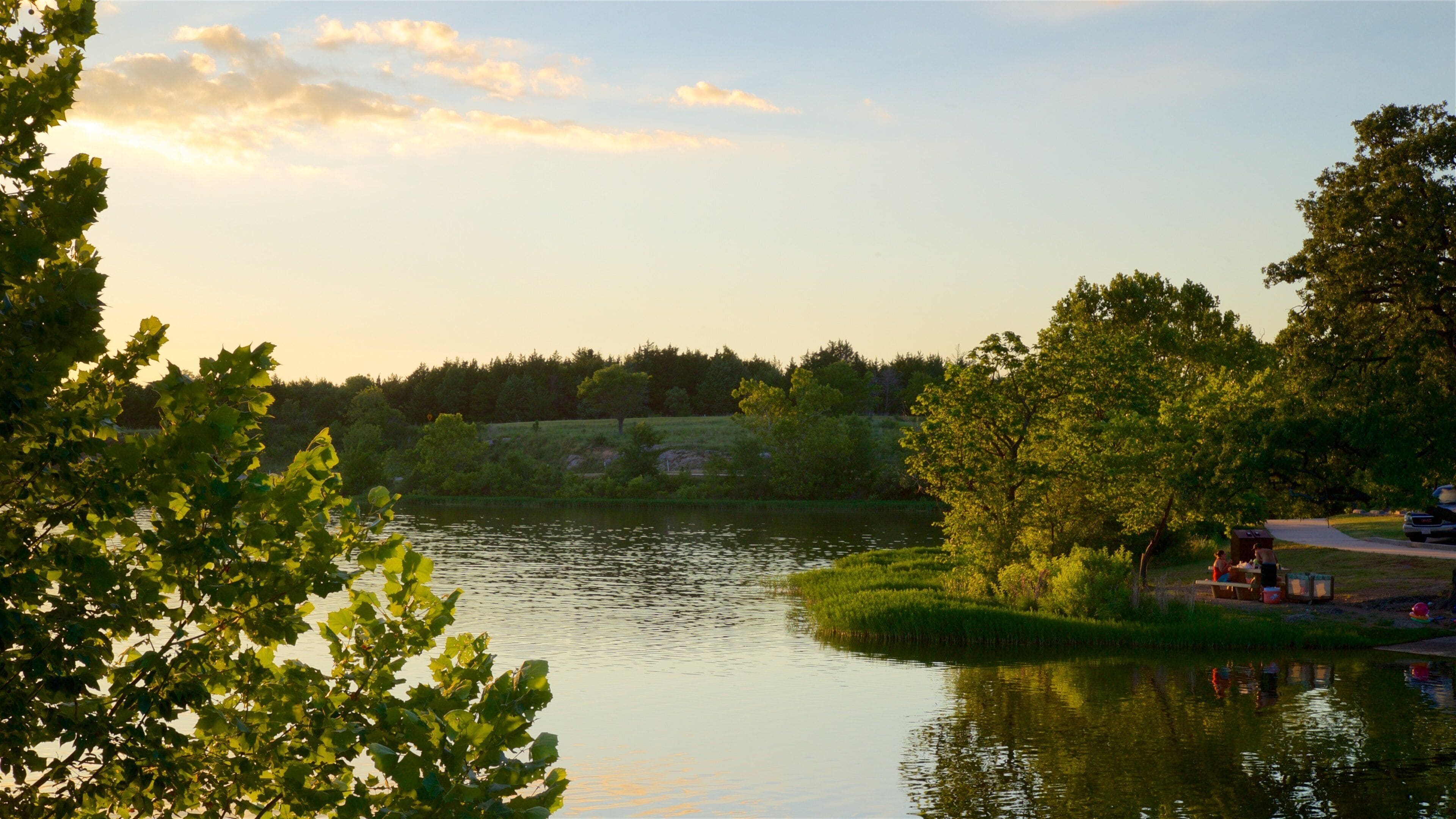 Veteran\'s Lake showing a lake or waterhole, a sunset and a garden
