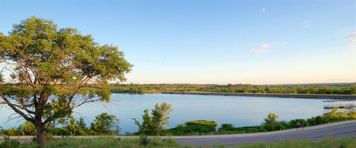 Veteran\'s Lake featuring a sunset, landscape views and a lake or waterhole