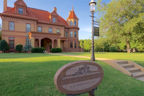 Overholser Mansion which includes signage, a park and heritage elements