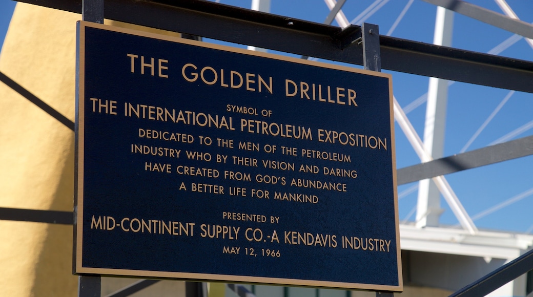 Golden Driller featuring signage