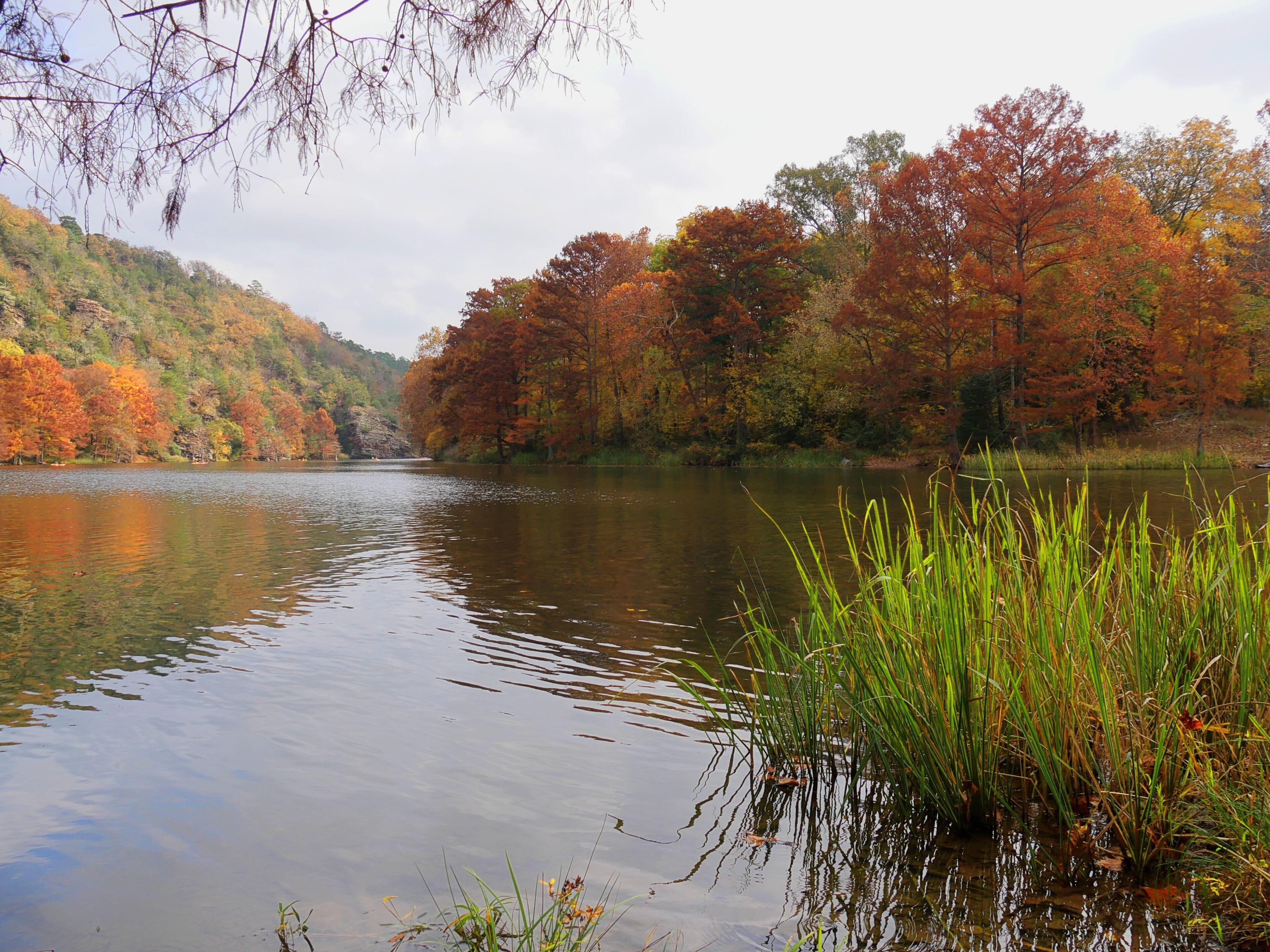 Popular Mountain Forks River at the Beavers Bend State Parks in Broken Bow, Oklahoma with colorful foliage in autumn