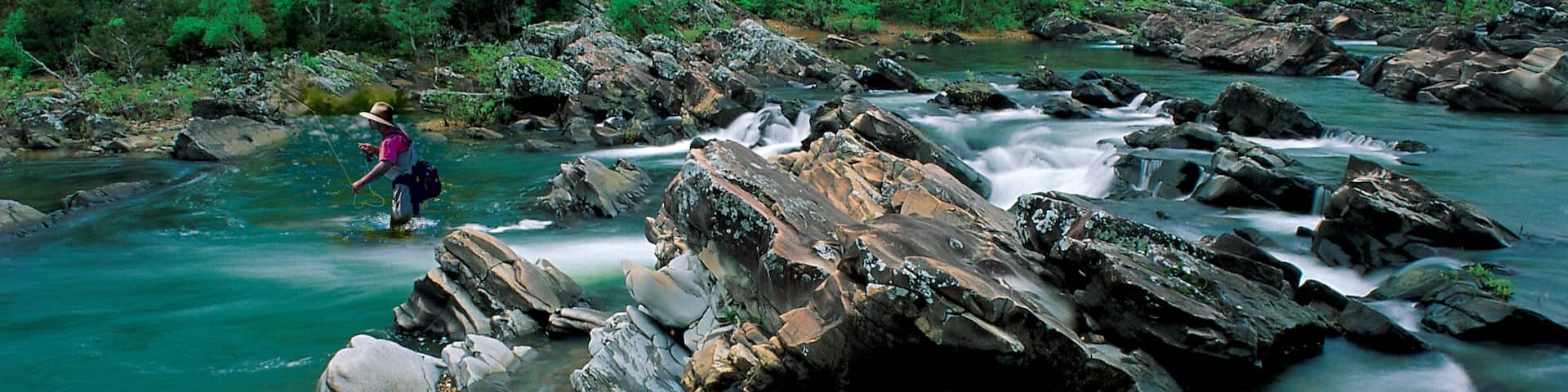 Cossatot River State Park featuring a river or creek as well as an individual male