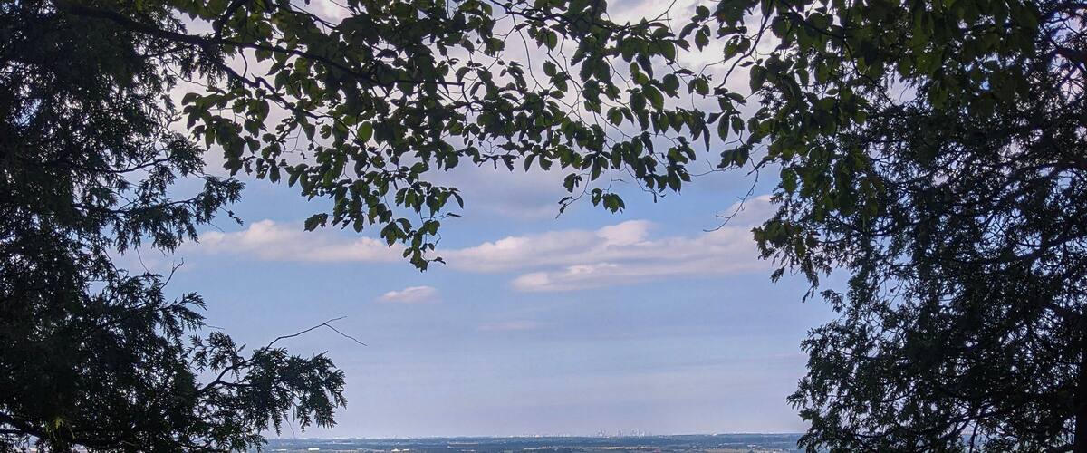 A view from the top of the Niagara Escarpment looking down at a golf course. At Kelso Park along the Bruce Trail in Milton, Ontario during the summer