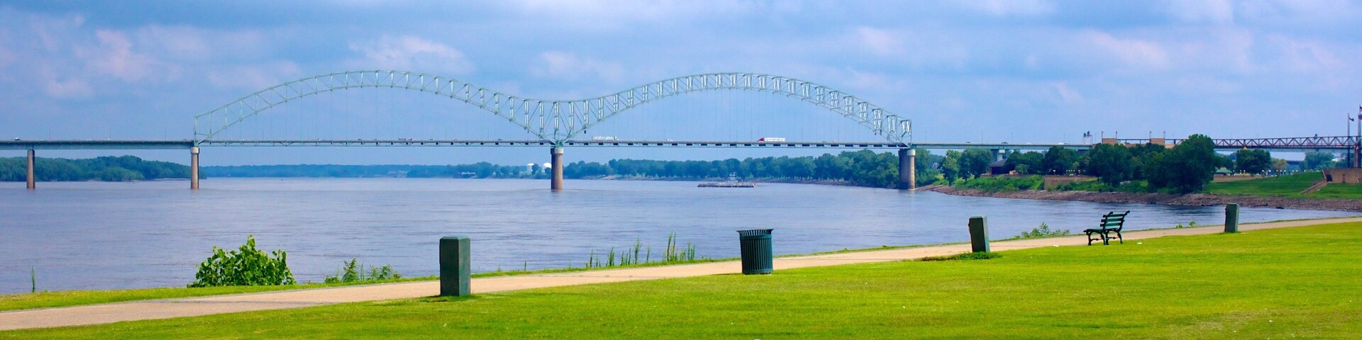 Memphis showing a garden, a bridge and a river or creek