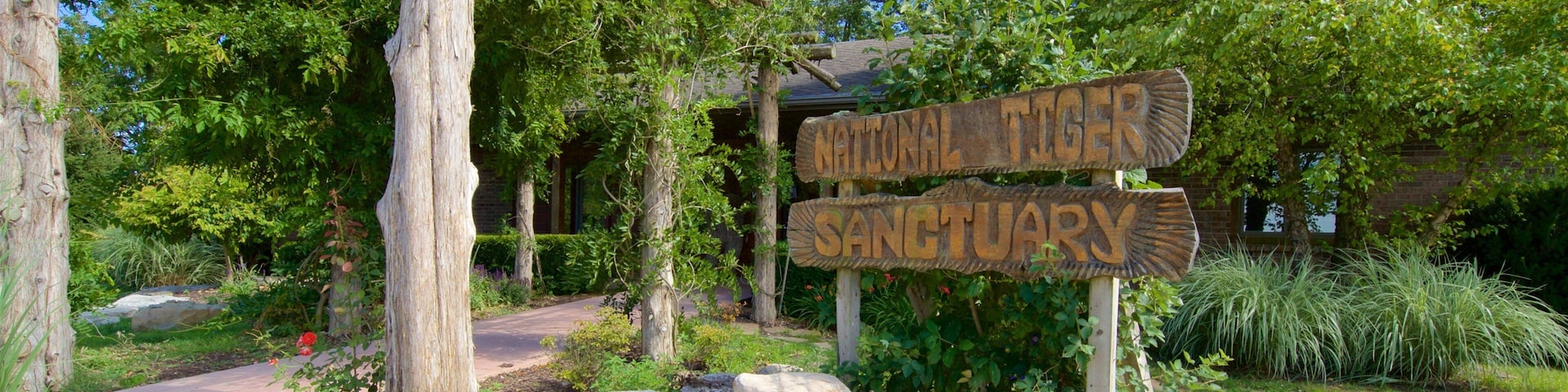 National Tiger Sanctuary qui includes signalisation et animaux de zoo