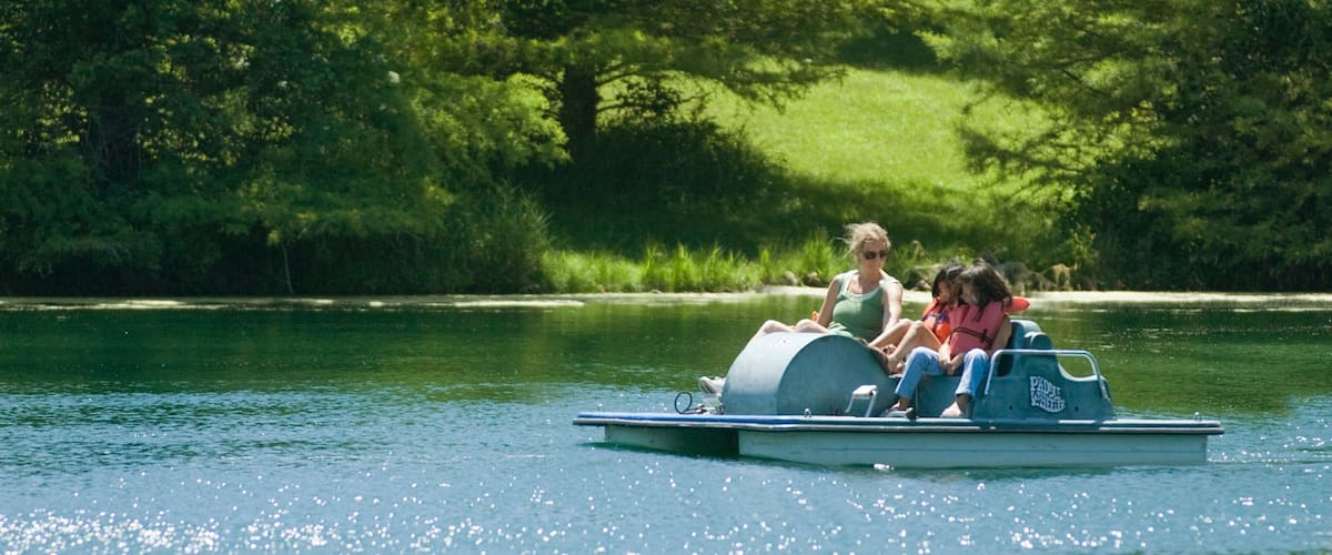 Platte River showing a river or creek and watersports as well as a family