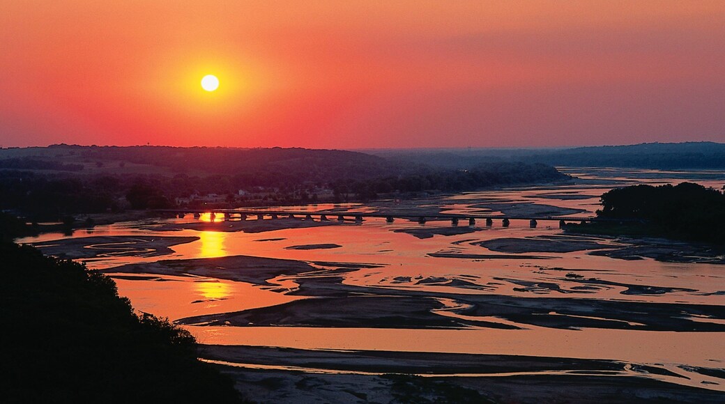Lincoln showing a sunset, a river or creek and landscape views