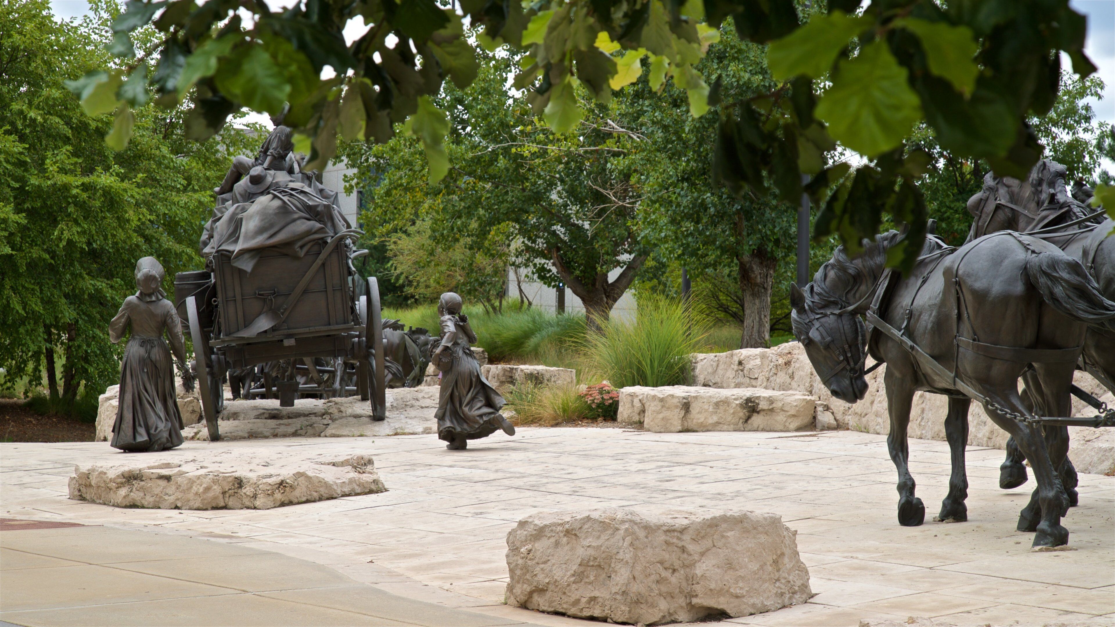 Pioneer Courage Park which includes a statue or sculpture and a park