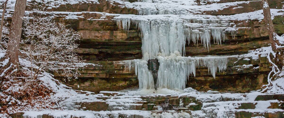 Landscape with a frozen waterfall at Creve Coeur Park near St. Louis Missouri