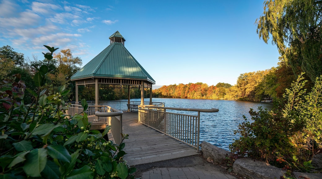 A gazebo park structure in autumn at Mill Pond in Centennial Park, Milton, Ontario, Canada