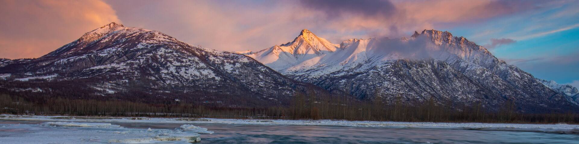 Alpenglow on a winter night in Alaska, USA