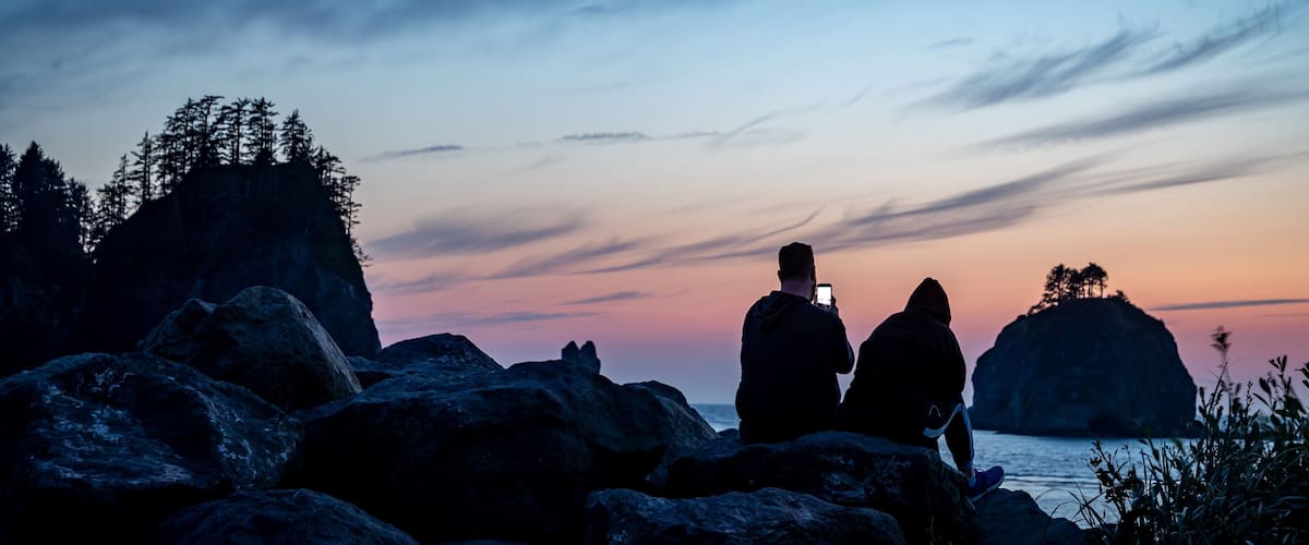 La Push which includes a sunset and general coastal views as well as a couple
