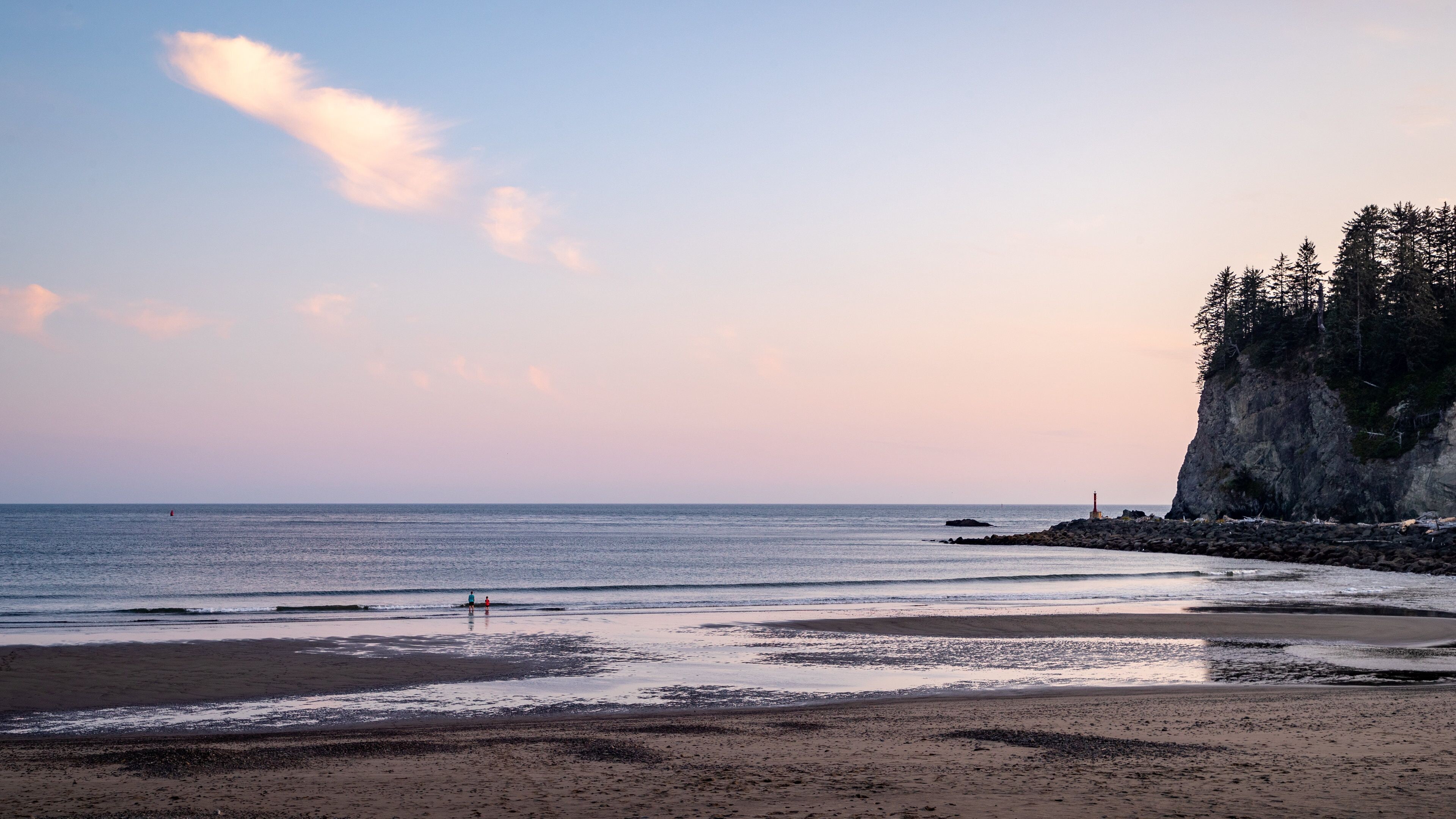 La Push which includes general coastal views, a sunset and a beach