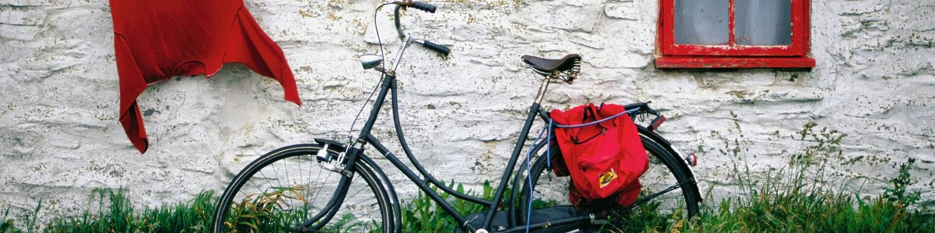 Bicycle outside a cottage, Cregnesh, Isle of Man, British Isles