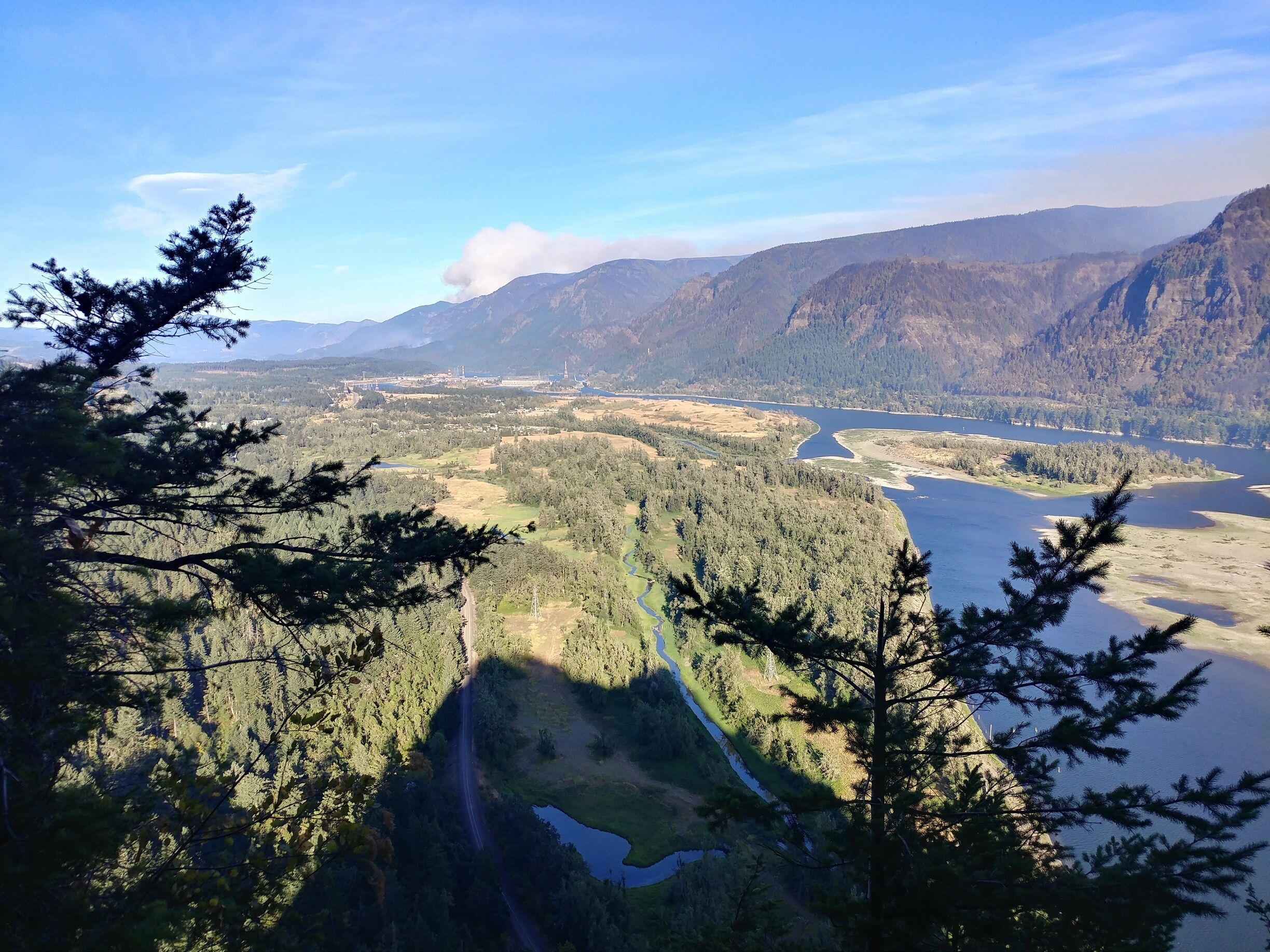 Beacon rock is a hikable 848-foot basalt volcanic plug on the Washington side of the Columbia River. There is a 3/4 mile trail that ascends the rock and 51 switchbacks later, you're rewarded with incredible views of the Columbia River Gorge. The currents views are a little sad as the damage from recent fire forests is quite evident in the Oregon side of the river.