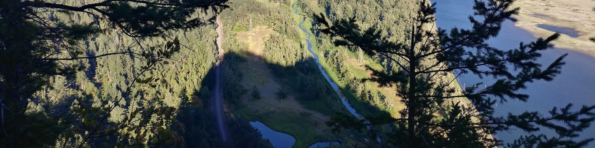 Beacon rock is a hikable 848-foot basalt volcanic plug on the Washington side of the Columbia River. There is a 3/4 mile trail that ascends the rock and 51 switchbacks later, you're rewarded with incredible views of the Columbia River Gorge. The currents views are a little sad as the damage from recent fire forests is quite evident in the Oregon side of the river.