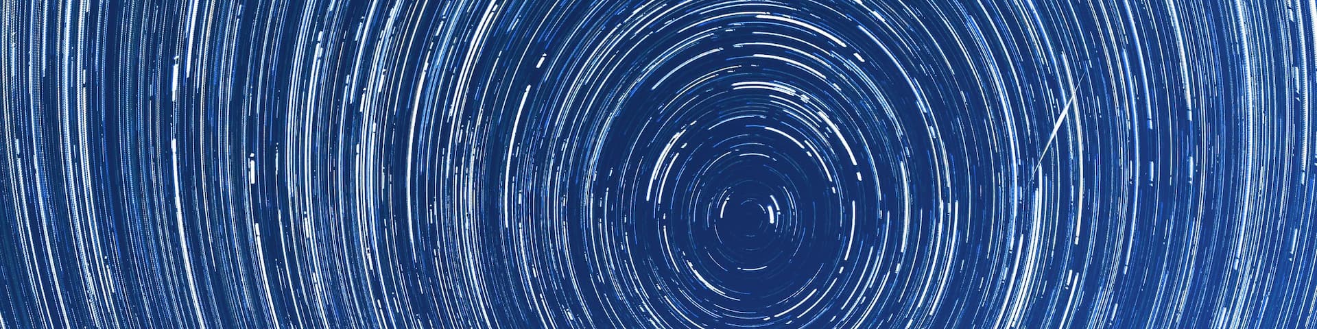 The southern shore of the Hood Canal in Union, Washington can be a great place for astrophotography - especially on a pleasant summer night.
Between the boats docked on shore, a higher position of Polaris in the night sky, and the beautiful rolling evergreen hills, there are plenty of great subjects to capture!