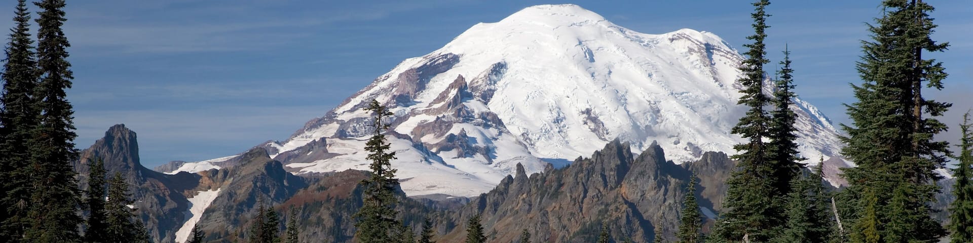 Reflection of a snowcapped mountain in a lake, Tipsoo Lake, Mount Rainier, Mount Rainier National Park, Washington, USA