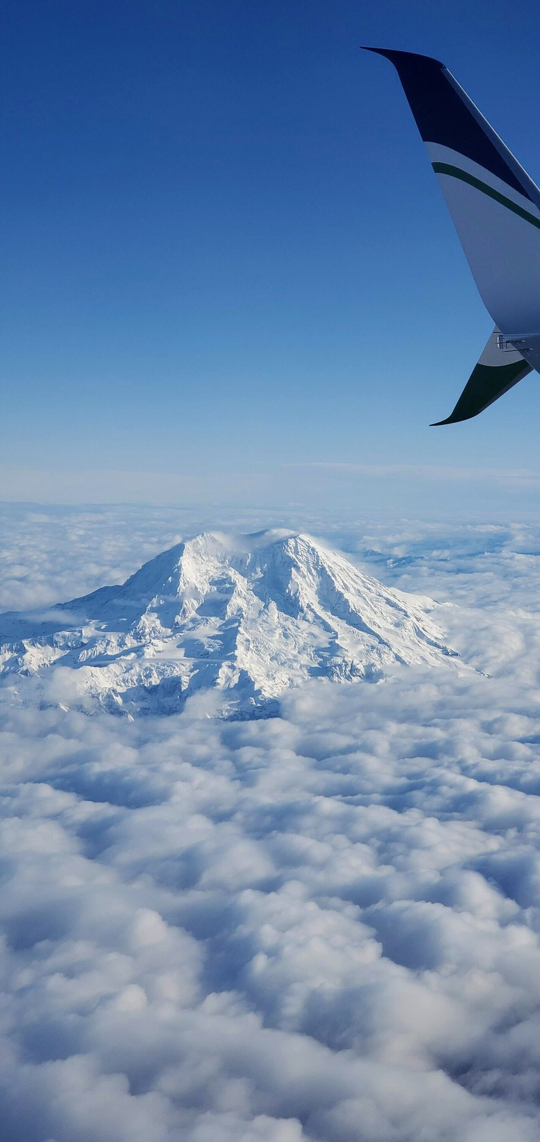 The reason you want a window seat any time you fly in and out of Seattle. On a clear day pilots love to fly by Mt. Rainier #LifeAtExpediaGroup
