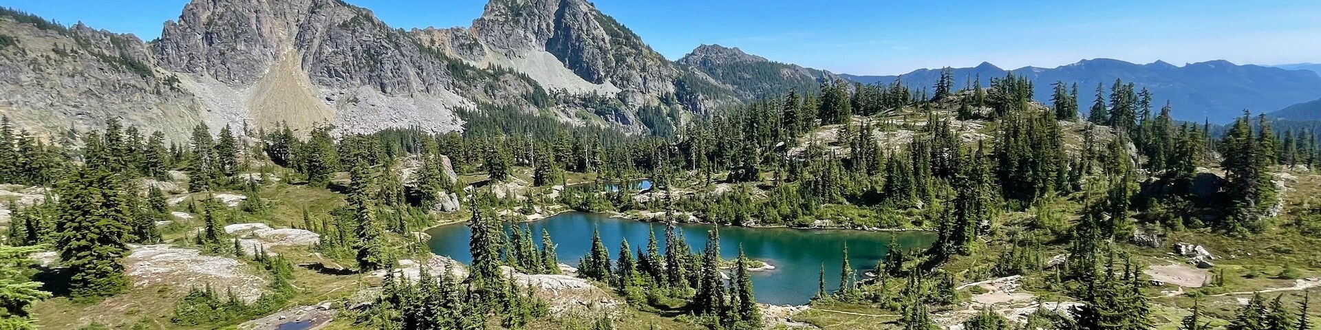 Emerald Peaks: Stunning Blue and Green Hidden Mountain Landscape