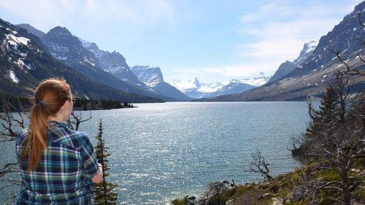 Just after the entrance to Glacier National Park there is a small path leading out on a rock formation that provides incredible views of the mountain scape across the lake. We thought we would be able to take the Going To The Sun Road through the park, but it’s opening was delayed (it was already the middle of May) due to a late thaw and portions of the road were still covered in snow. This little overlook, only a short walk past the gate, was perfect after having driven over an hour out of the way to drive through the park. #mountains #nationalparks #roadtrip