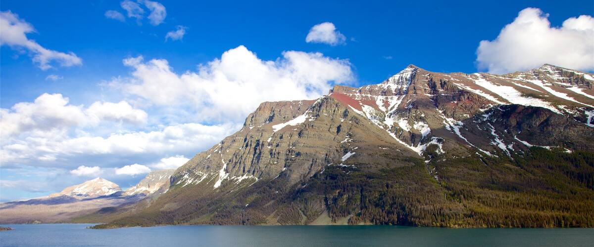 St. Mary Lake featuring mountains, a river or creek and landscape views