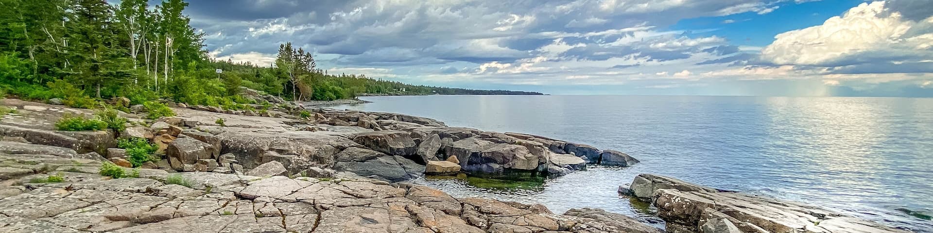 Dramatic viewpoint of storm clouds at Stoney Point on Lake Superior in Minnesota