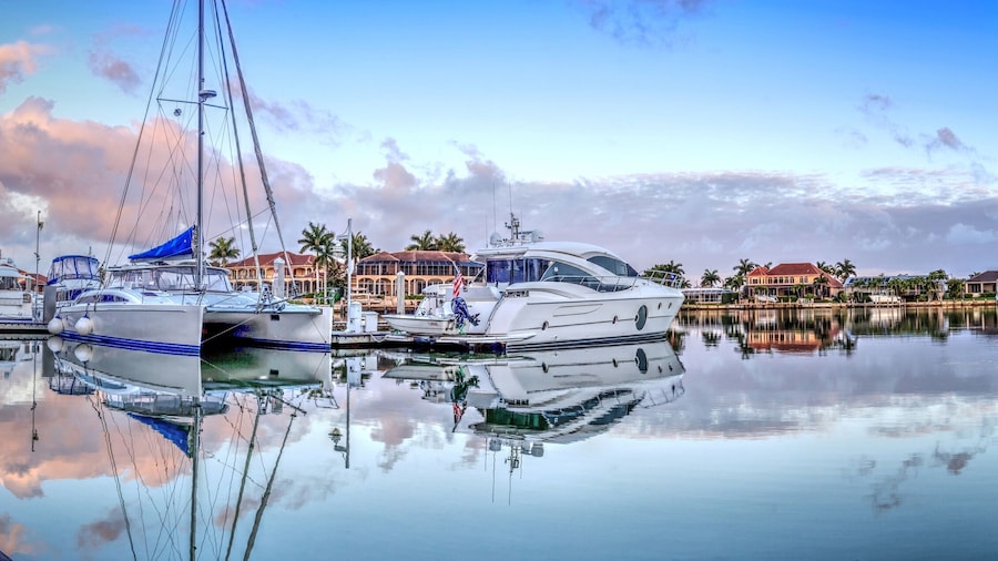 Sunrise over the boats in Esplanade Harbor Marina in Marco Island