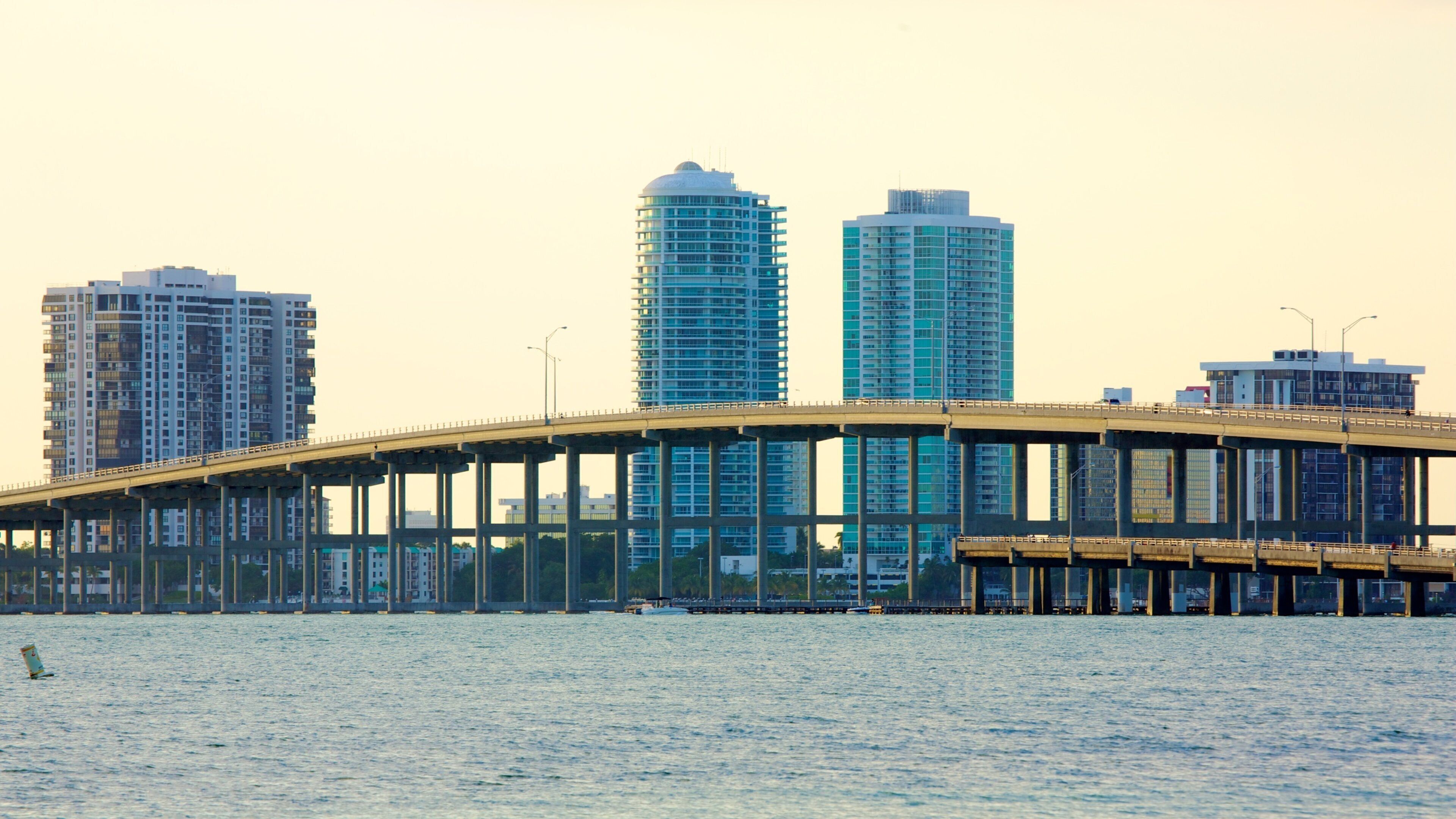 Miami which includes a skyscraper, a bridge and general coastal views